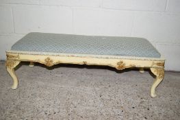 PAINTED WOOD UPHOLSTERED FOOT STOOL WITH GILT DECORATION, LENGTH APPROX 92CM