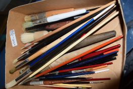 SMALL BOX CONTAINING PAINT BRUSHES