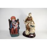 RESIN MODEL OF THE NATIVITY SCENE ON AN OVAL WOODEN BASE, TOGETHER WITH A FURTHER MODEL OF MARY