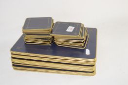 QUANTITY OF COASTERS AND TABLE MATS WITH FLEUR DE LYS DESIGN