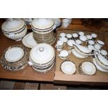 PART DINNER SERVICE BY WEDGWOOD IN THE CORNUCOPIA DESIGN COMPRISING PLATES, SIDE PLATES, LARGE