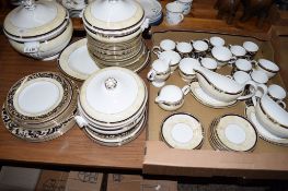 PART DINNER SERVICE BY WEDGWOOD IN THE CORNUCOPIA DESIGN COMPRISING PLATES, SIDE PLATES, LARGE