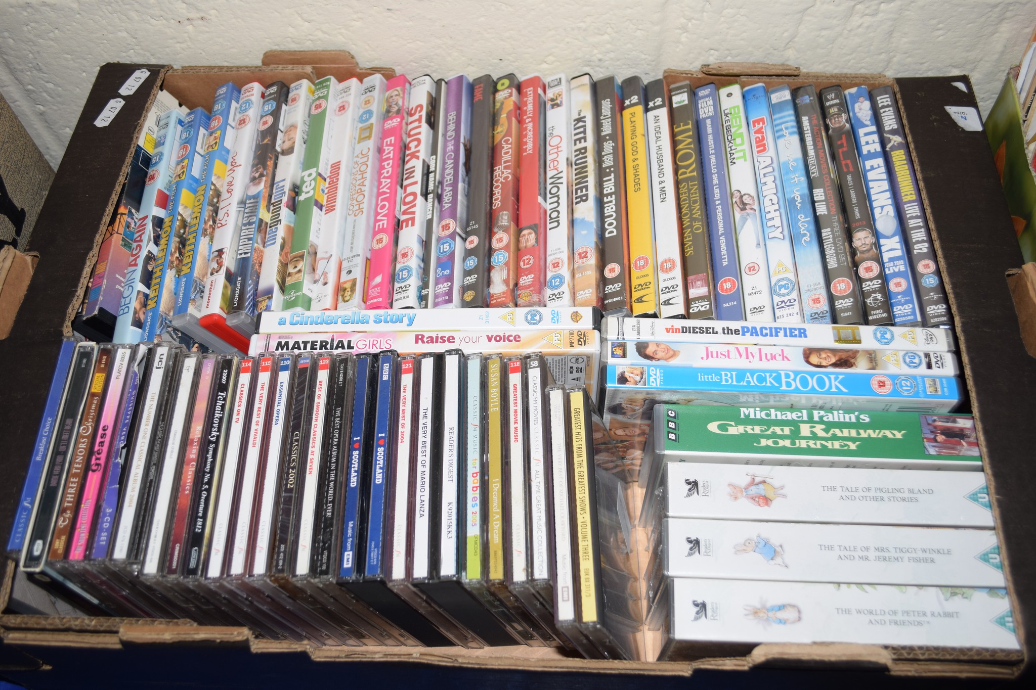 QUANTITY OF DVDS AND CDS