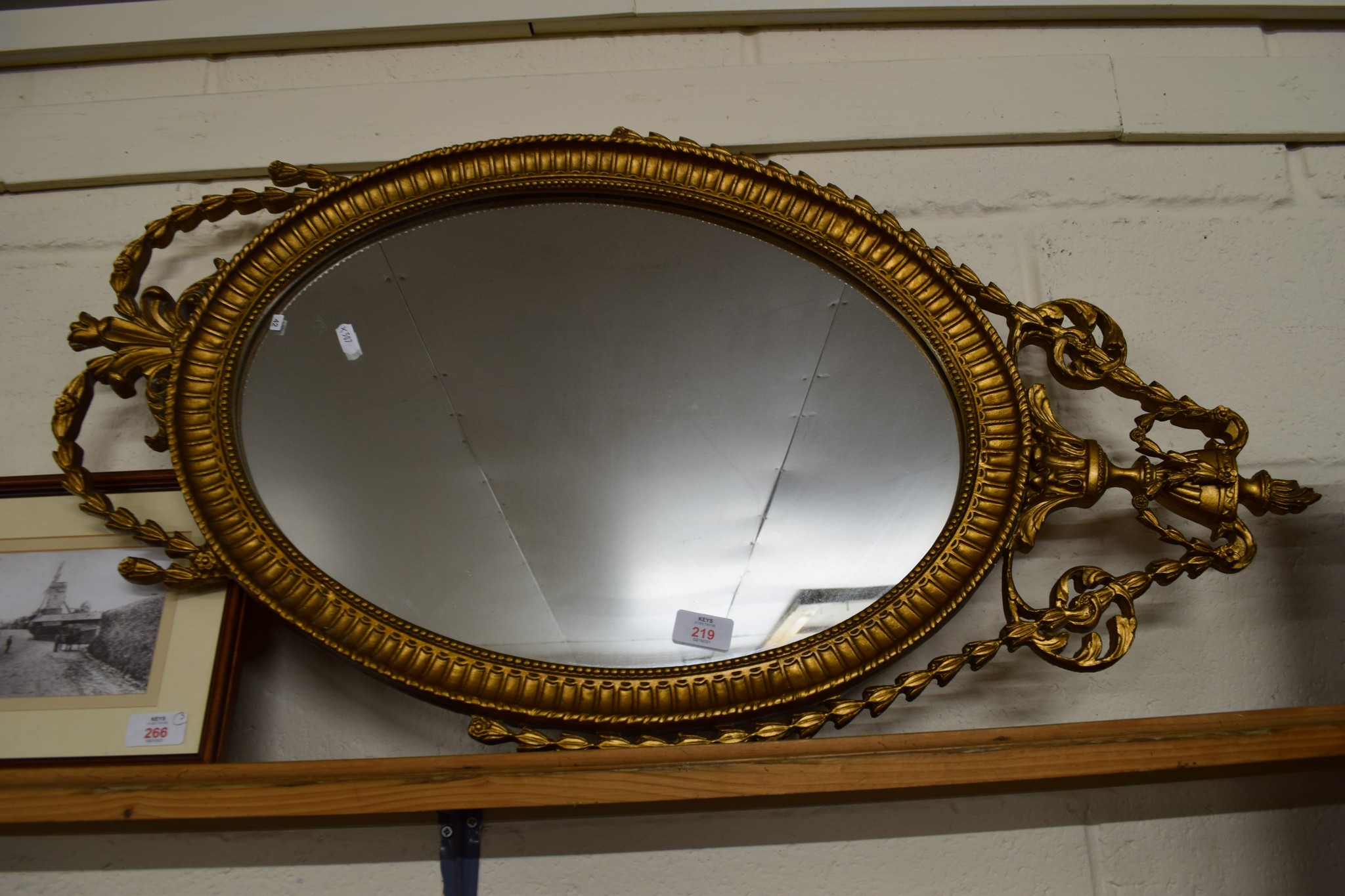 OVAL MIRROR IN GILT FRAME