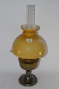 BRASS TABLE LAMP WITH AMBER SHADE AND CHIMNEY