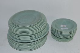 GREEN GLAZED WOODS DINNER WARES INCLUDING PLATES, SIDE PLATES AND BOWLS