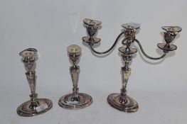 PAIR OF PLATED CANDLESTICKS AND FURTHER PLATED CANDELABRA