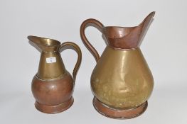 TWO LARGE COPPER JUGS