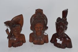 THREE CARVED FIGURES FROM ASIA