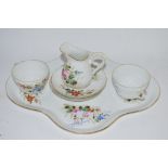 PORCELAIN TEA FOR TWO SET WITH SHAPED TRAY, TWO CUPS AND SAUCERS AND MILK JUG