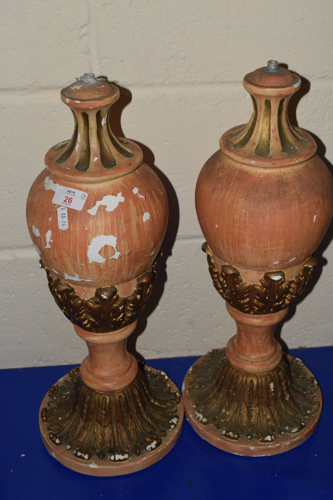 TWO TERRACOTTA LAMP BASES MODELLED IN CLASSICAL STYLE