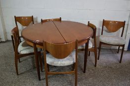 SET OF 1960S/70S UPHOLSTERED DINING CHAIRS TOGETHER WITH A MATCHING EXTENDING CIRCULAR DINING TABLE,