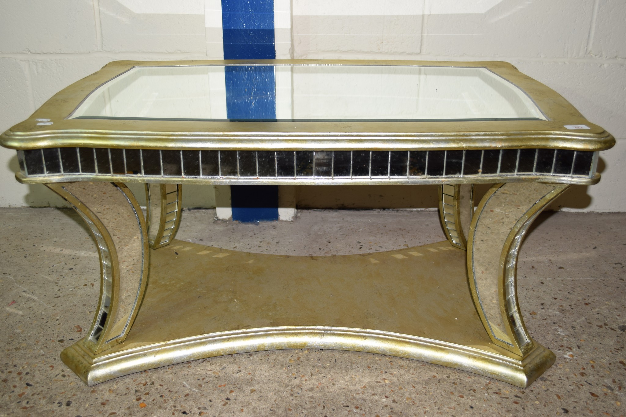 MODERN GILT FINISH MIRROR TOPPED COFFEE TABLE, APPROX 102 X 65CM