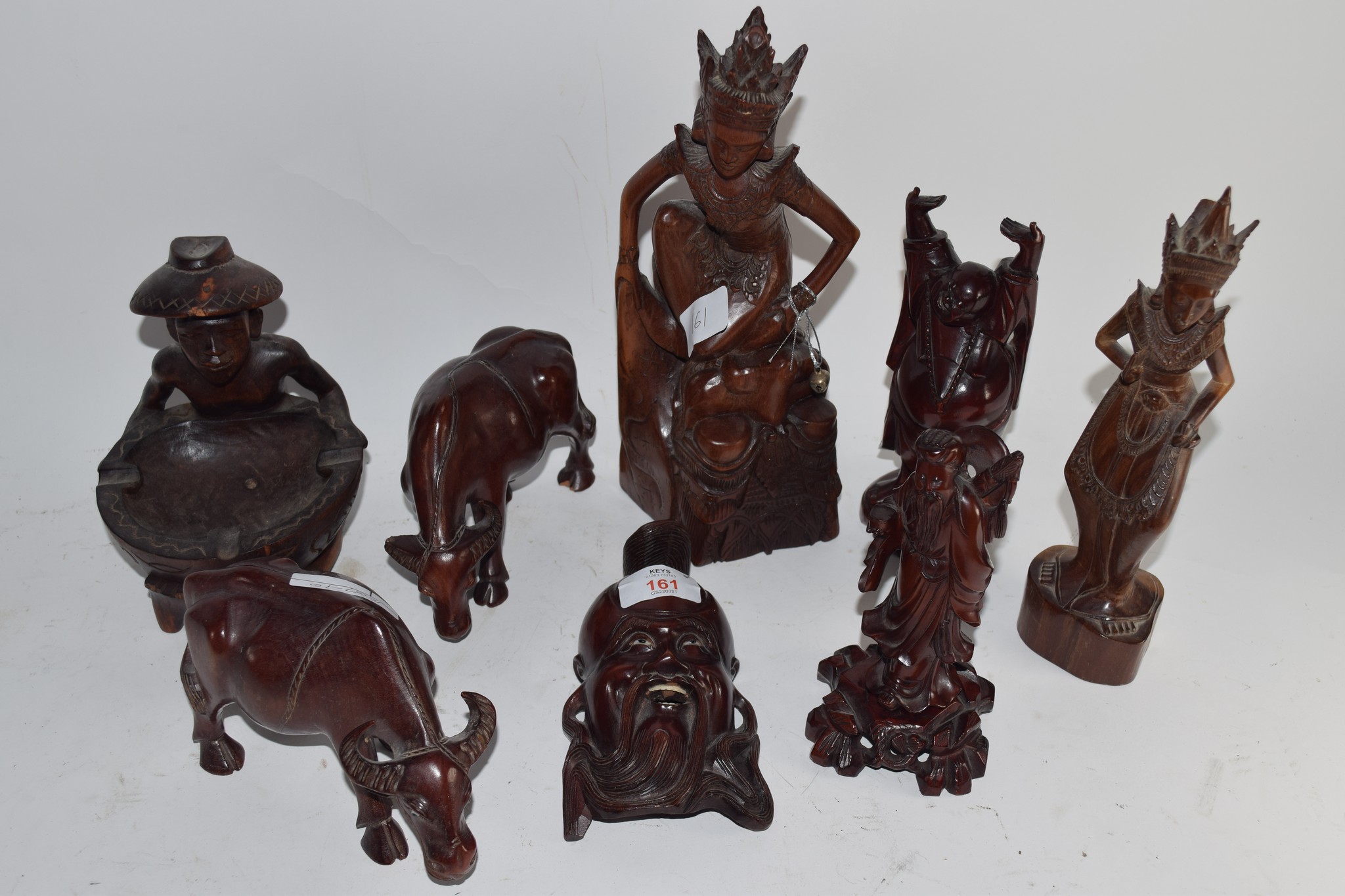 ORIENTAL ITEMS, CARVED WOODEN MODEL OF A FACE, WOODEN MODELS OF BUFFALO ETC