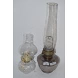 TWO GLASS OIL LAMPS