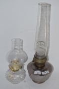 TWO GLASS OIL LAMPS