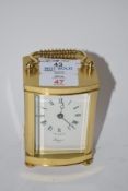 BRASS CARRIAGE CLOCK BY RAPPORT OF LONDON