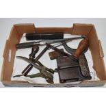 SMALL BOX CONTAINING VARIOUS AGRICULTURAL ITEMS, A TRACTOR BELT, JOINER, WOODEN STARTING HANDLE ETC