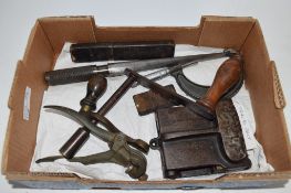 SMALL BOX CONTAINING VARIOUS AGRICULTURAL ITEMS, A TRACTOR BELT, JOINER, WOODEN STARTING HANDLE ETC