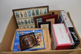 BOX CONTAINING VARIOUS SUNDRIES, FRAMED CIGARETTE CARDS, BOX OF GAMES, SOME PHOTO FRAMES ETC