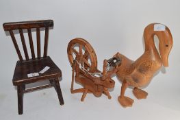 MODEL OF A CHAIR WITH A WOODEN SPINNING WHEEL AND A MODEL OF A DUCK