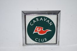 PLASTIC BAG CONTAINING BADGE FOR THE CARAVAN CLUB