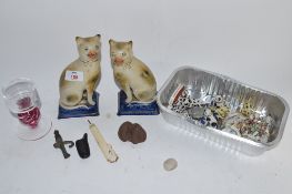 TRAY CONTAINING GLASS AND CERAMIC WARES INCLUDING A PAIR OF POTTERY CATS, SMALL MODELS OF CATS, SOME