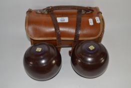 LEATHER CASED SET OF TWO VINTAGE BOWLS