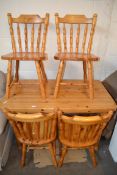 MODERN PINE KITCHEN TABLE PLUS FOUR MATCHING CHAIRS WITH SPINDLED BACKS, 123CM WIDE