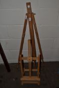 TWO DISPLAY EASELS, LARGEST 109CM HIGH