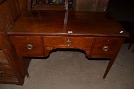 REPRODUCTION THREE DRAWER DRESSING TABLE WITH BRASS RINGLET HANDLES AND CASTERS, 114CM WIDE