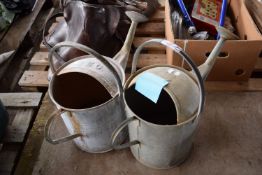 TWO GALVANISED WATERING CANS