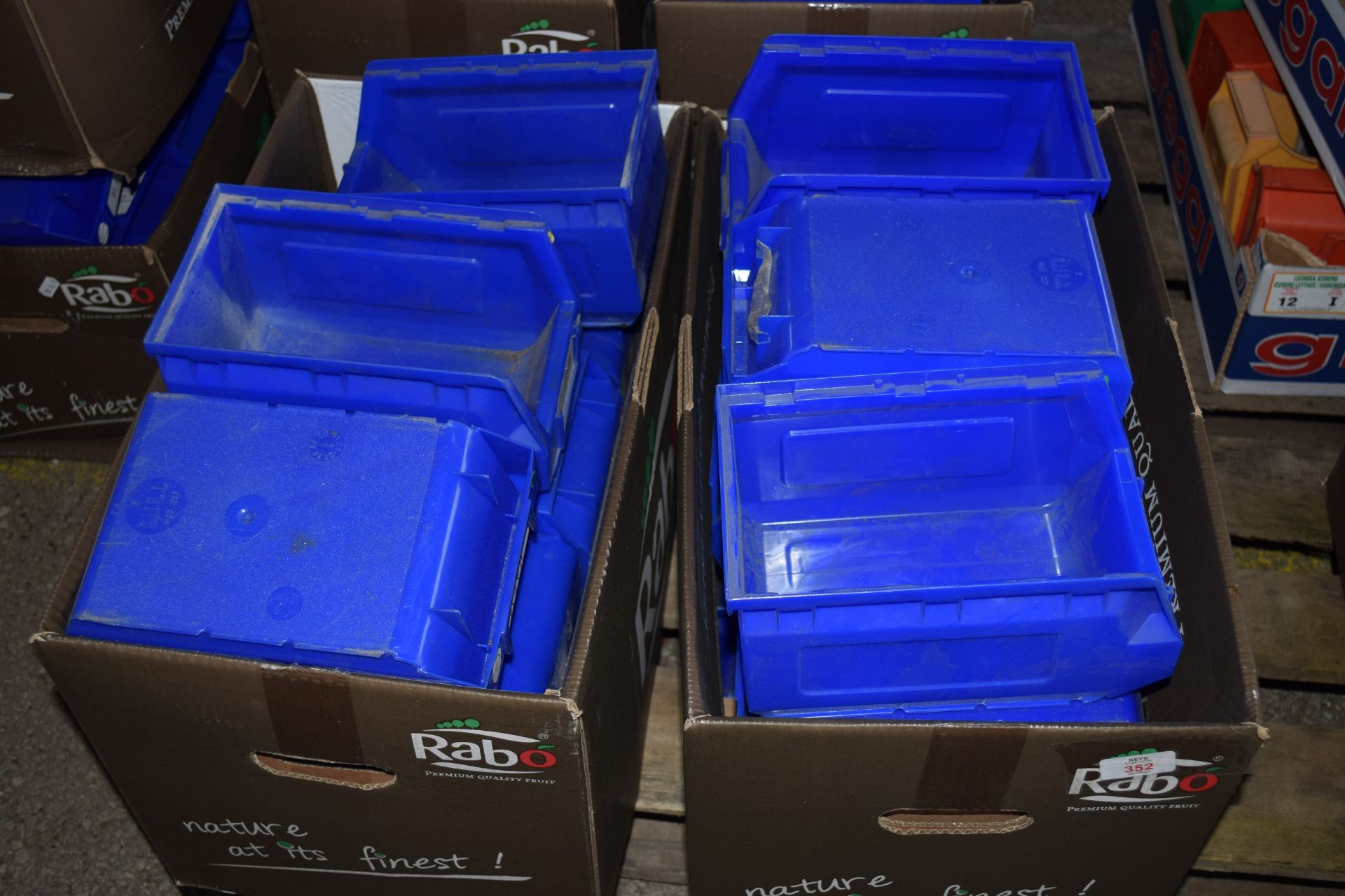 Two boxes of storage tubs