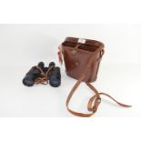 PAIR OF BINOCULARS IN LEATHER CASE