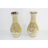 TWO ORIENTAL VASES WITH A RELIEF DESIGN OF BIRDS ON BRANCHES ON METAL