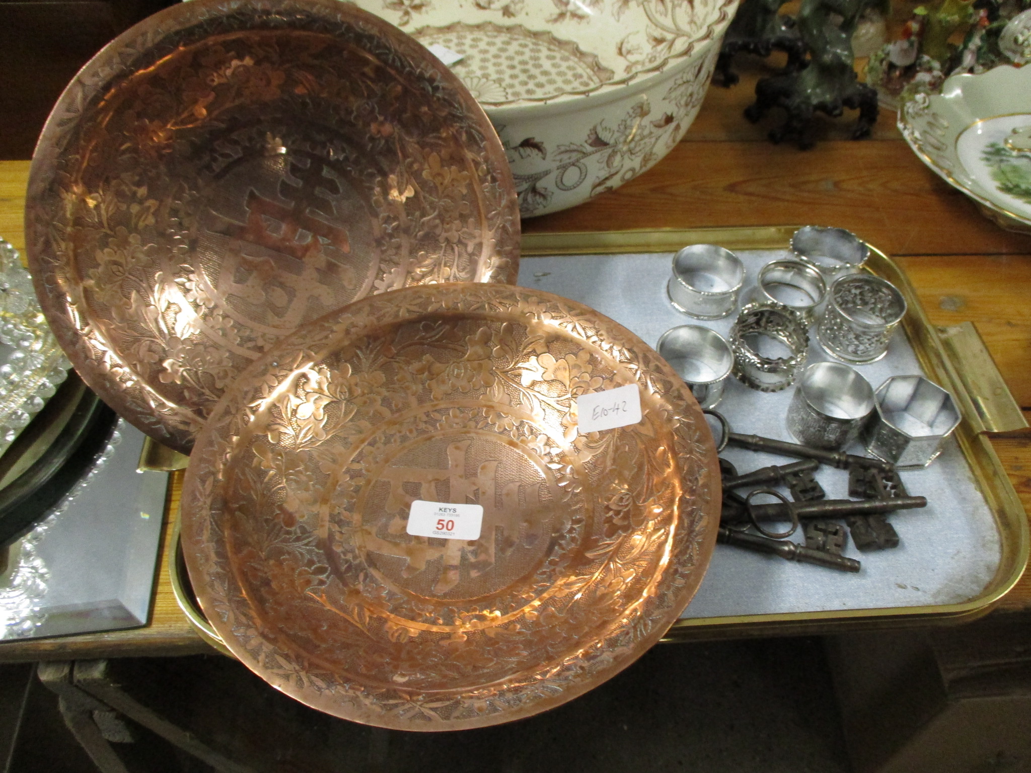 TRAY CONTAINING TWO COPPER BOWLS, ORIENTAL DESIGN, AND GROUP OF PLATED NAPKIN RINGS AND ONE SILVER