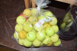 BAG CONTAINING YELLOW GOLF BALLS