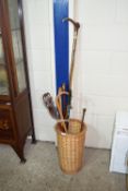 WICKER STICK STAND TOGETHER WITH CONTENTS INCLUDING VARIOUS WALKING STICKS, RIDING CROP AND SHOOTING