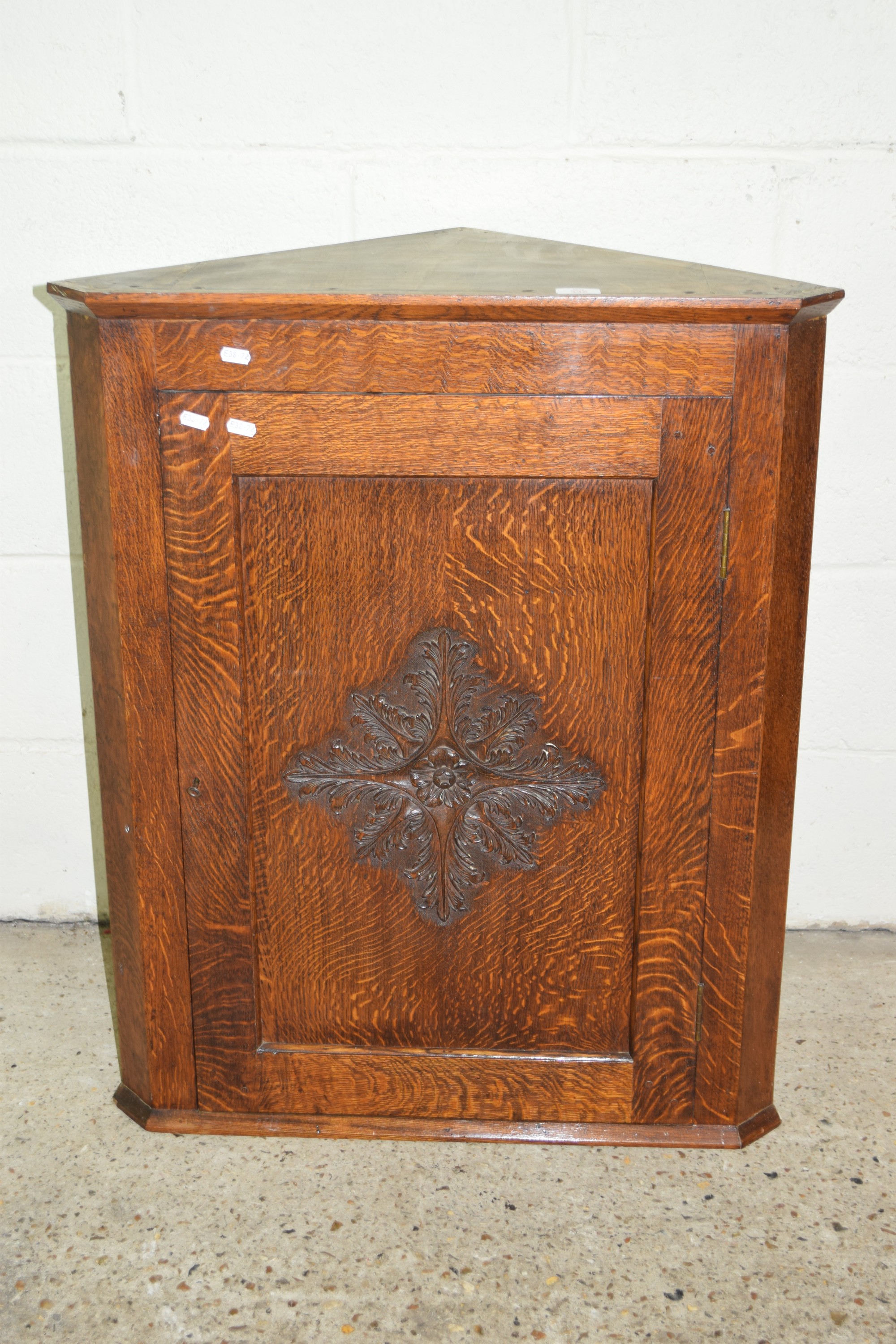 OAK CORNER WALL CUPBOARD WITH CARVED DECORATION, APPROX WIDTH 70CM MAX