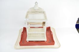 TWO WOODEN TRAYS, ONE DECORATED WITH DOVES, AND A FURTHER WOODEN BIRD CAGE