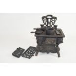 BOX CONTAINING METAL MODEL OF A STOVE