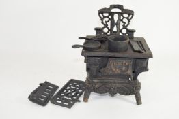 BOX CONTAINING METAL MODEL OF A STOVE