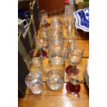 GLASS WARES INCLUDING MULTI-COLOURED WINE GLASSES, WHISKY TUMBLERS ETC