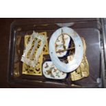 SMALL TRAY CONTAINING TWO ENAMEL BADGES DECORATED WITH BUTTERFLIES, MOTHER OF PEARL TYPE BROOCH ETC