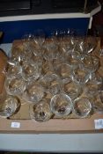 TRAY CONTAINING WINE GLASSES AND BRANDY GLASSES