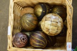 BASKET CONTAINING WOODEN BALLS