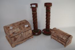 PAIR OF WOODEN CANDLESTICKS, TOGETHER WITH A WOODEN TRUNK