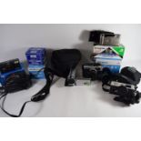 BOX CONTAINING CAMERA EQUIPMENT INCLUDING OLYMPUS CAMERA, PANASONIC VIDEO CAMERA ETC