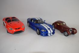 THREE MODEL CARS, ONE OF A MUSTANG BY MISTO, ONE OF A DODGE VIPER BY MISTO