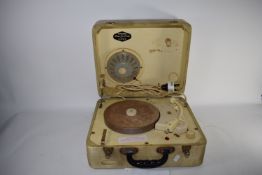 CASED MODEL OF A RECORD PLAYER CIRCA 1950S, TOGETHER WITH VINTAGE RECORDS